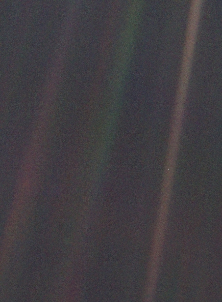No Voyager discussion is complete without the beautiful Pale Blue Dot photograph. See that tiny dot on the right, on the brown stripe? That's our Earth. Voyager 1 had already flown six billion kilometers at that point. And three RTGs flew with it