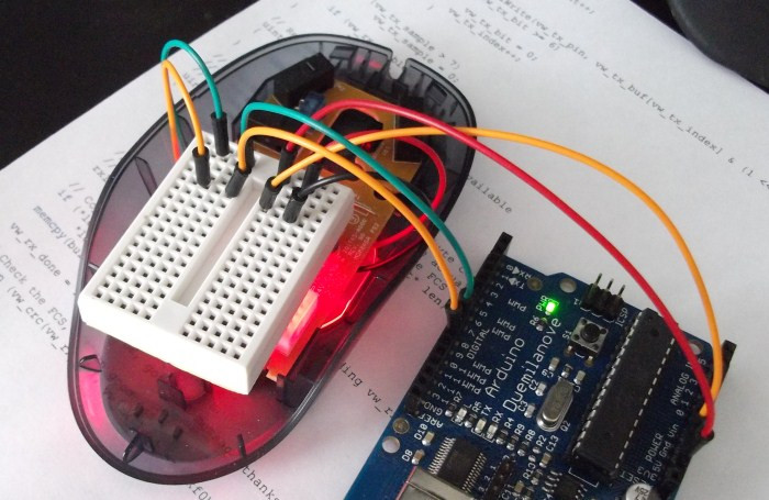 Disassembled optical mouse showing sensor chip