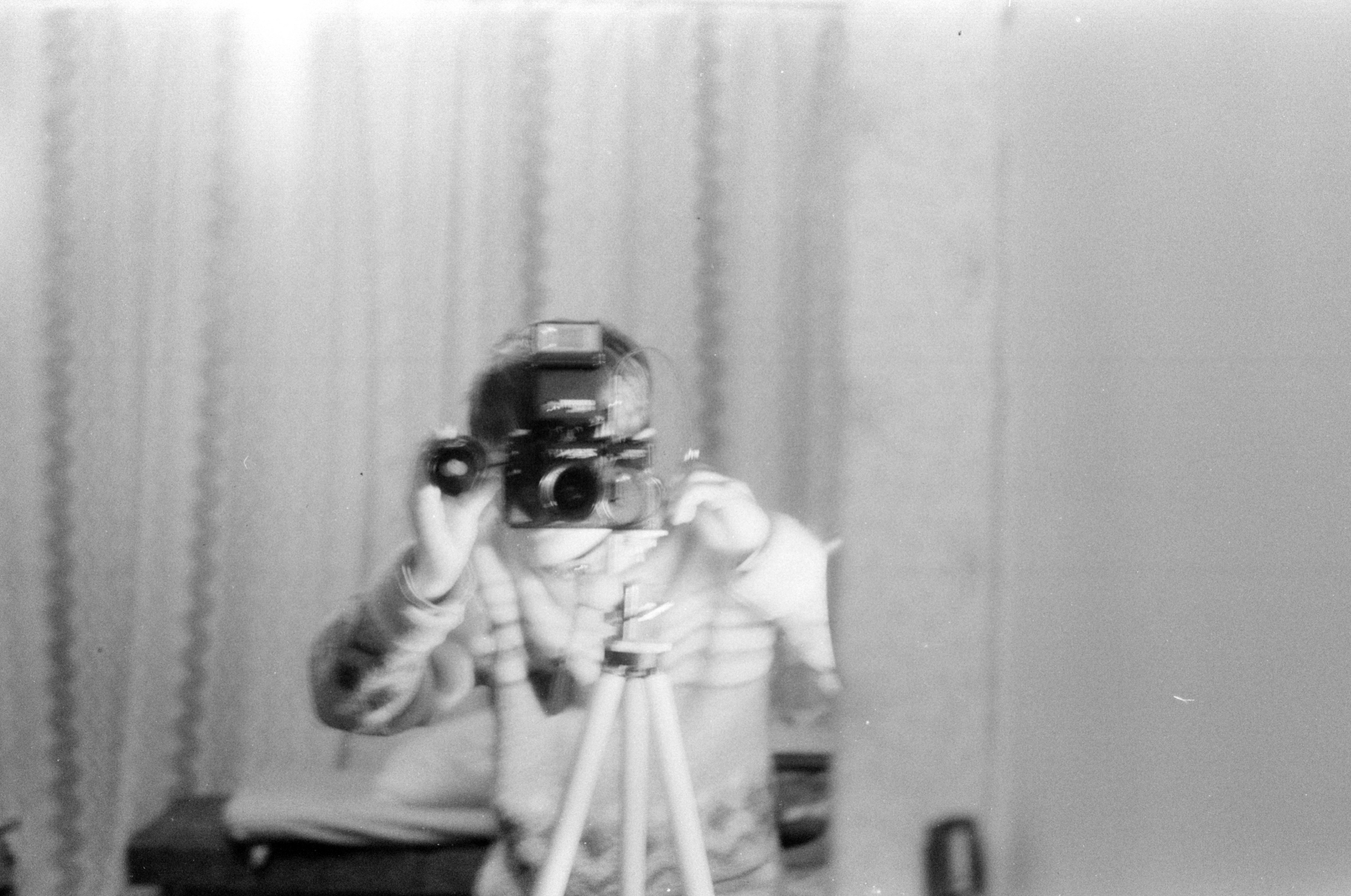 Self-portrait with film camera