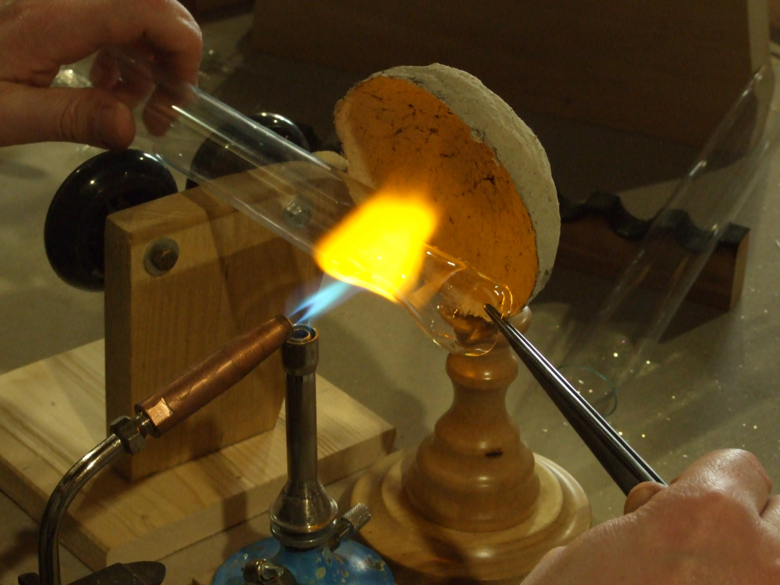 Flame-working the glass envelope