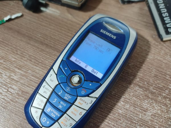 The Bean Recipe: How I Reverse-Engineered a Budget Button Phone, Hacked It, and Taught It to Run Native C Programs